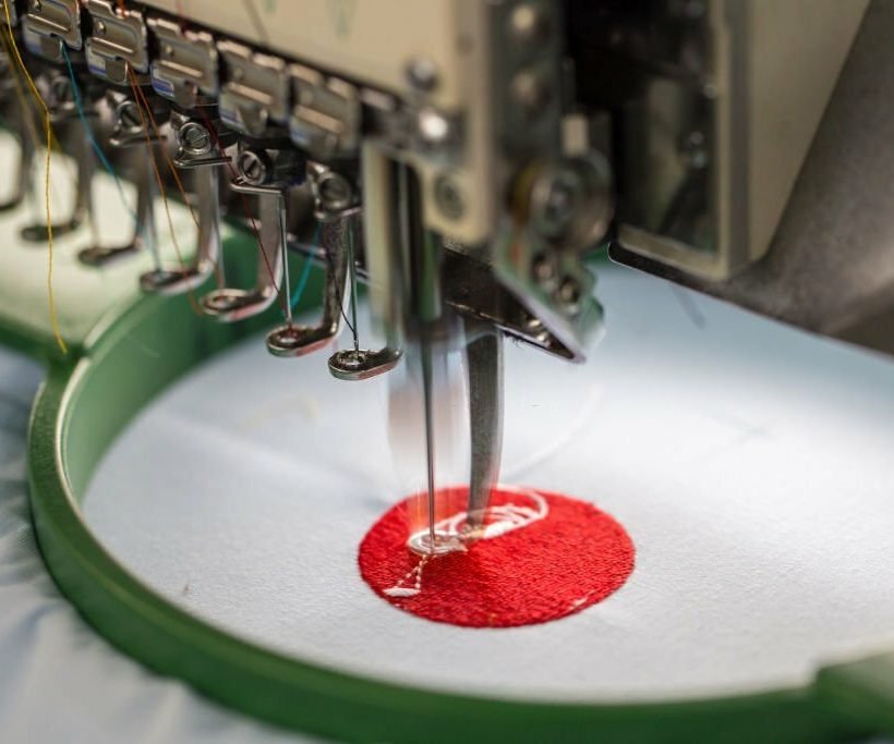 Embroidery machine needle in Textile Industry at Garment Manufacturers, Embroidery needle, Needle with thread (selective focus and soft focus)